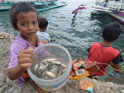 Childrens Fishing at port area